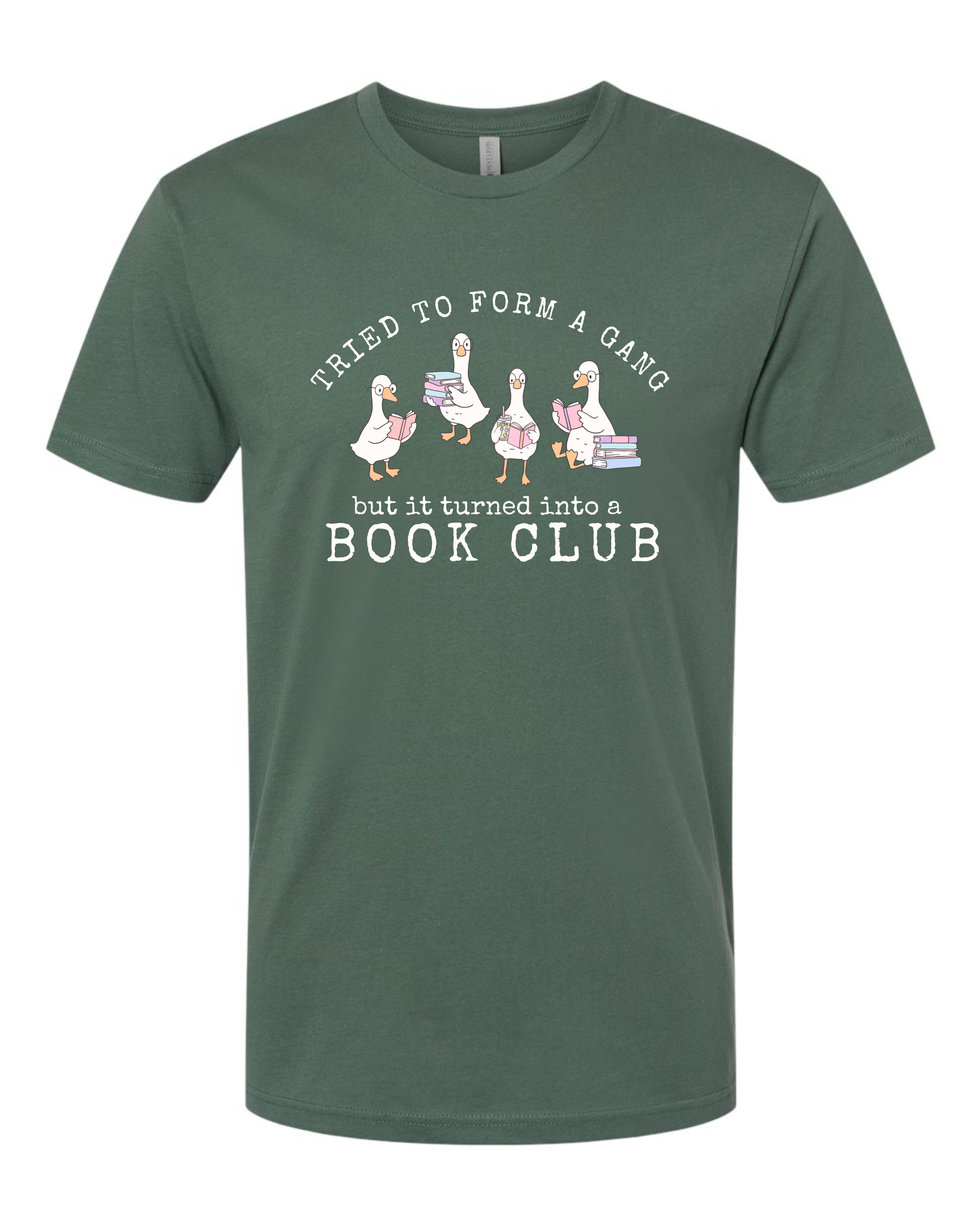 A royal pine short-sleeve crewneck t-shirt with a graphic print on the front. The graphic features four cartoon geese holding stacks of books, with the text 'Tried to form a gang but it turned into a BOOK CLUB' in white.