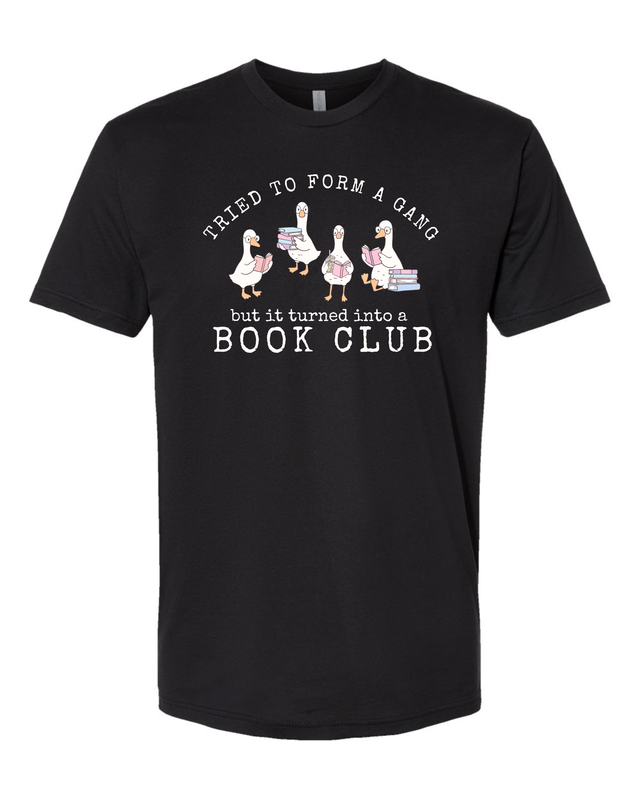 A black short-sleeve crewneck t-shirt with a graphic print on the front. The graphic features four cartoon geese holding stacks of books, with the text 'Tried to form a gang but it turned into a BOOK CLUB' in white.