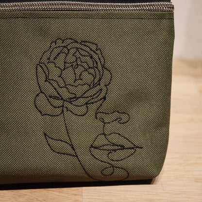 Face with flower bag